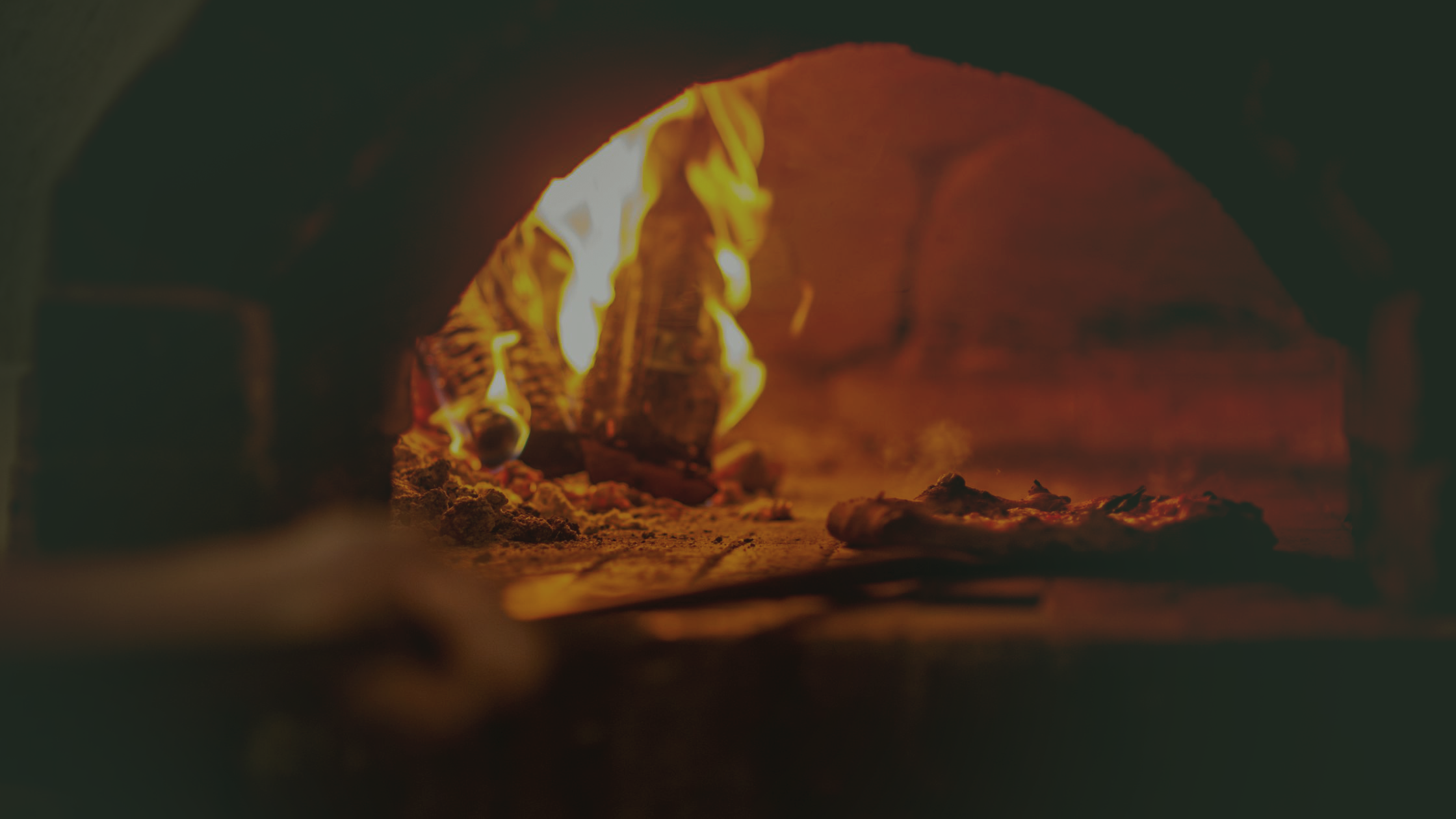 Forno a legna acceso della Pizzeria Giorgione